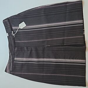 black skirt with pink stripes